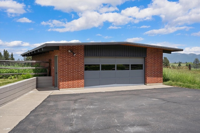 view of side of property with brick siding