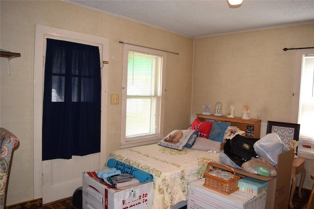 bedroom featuring a textured ceiling