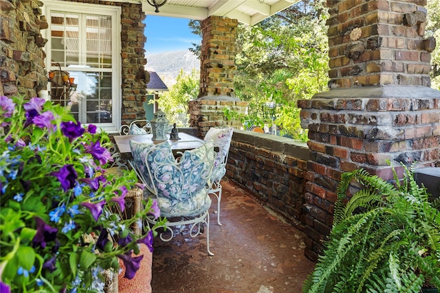 view of patio / terrace with a mountain view