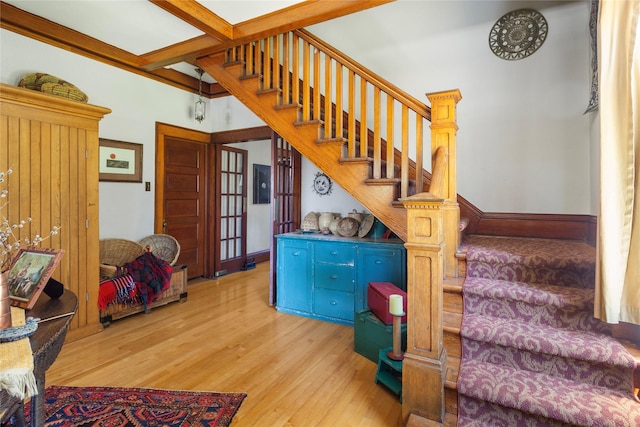 stairway featuring hardwood / wood-style flooring