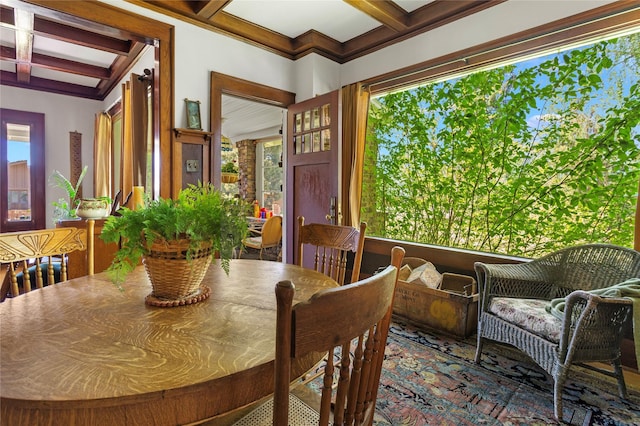 dining room with beam ceiling and coffered ceiling