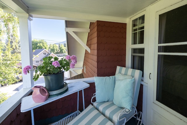 balcony featuring a porch