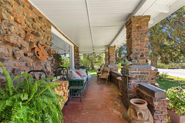 view of patio featuring a porch