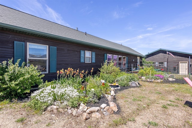 3851 Reed Butte Rd, Stevensville, MT 59870 - rear view of property with roof with shingles