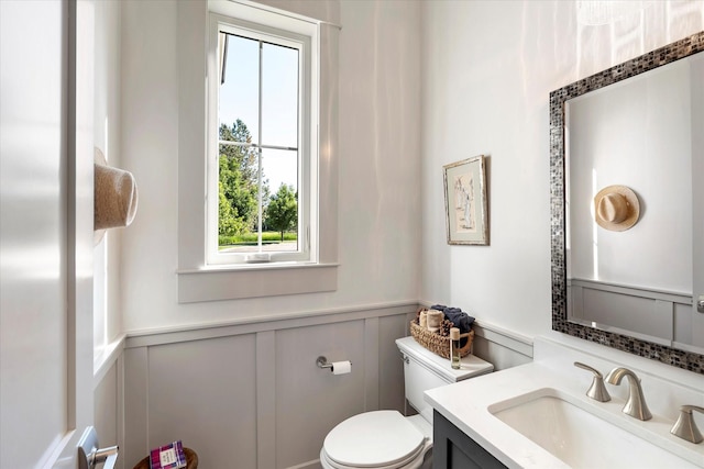 bathroom with vanity and toilet