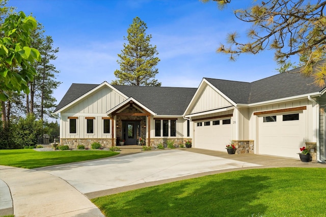 craftsman-style house with a garage and a front yard