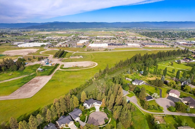 drone / aerial view featuring a mountain view