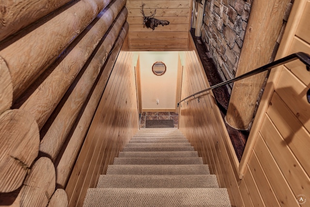 stairway with wood-type flooring