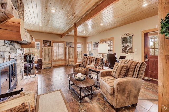 tiled living room with beamed ceiling, a fireplace, and wood ceiling