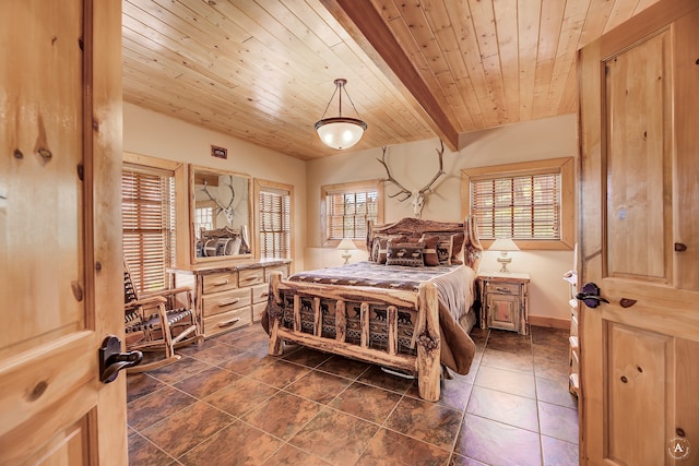 tiled bedroom featuring beamed ceiling and wooden ceiling