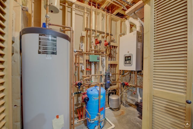 utility room featuring water heater