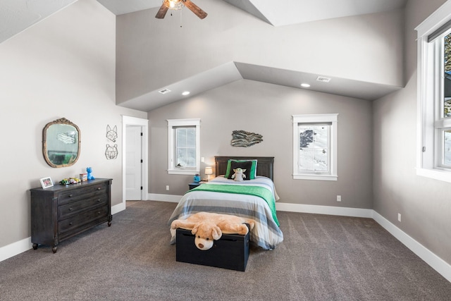 bedroom with carpet flooring, baseboards, and multiple windows