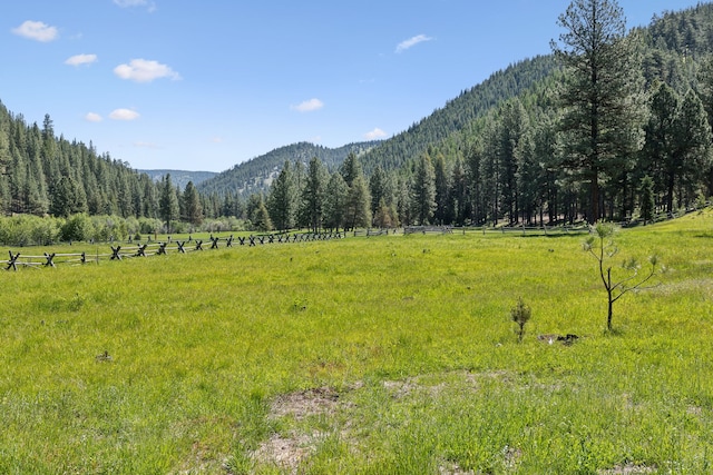 property view of mountains featuring a rural view