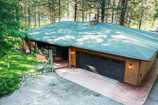 view of front of home featuring a chimney