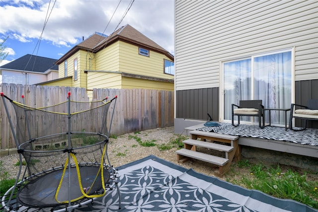 view of yard featuring a trampoline