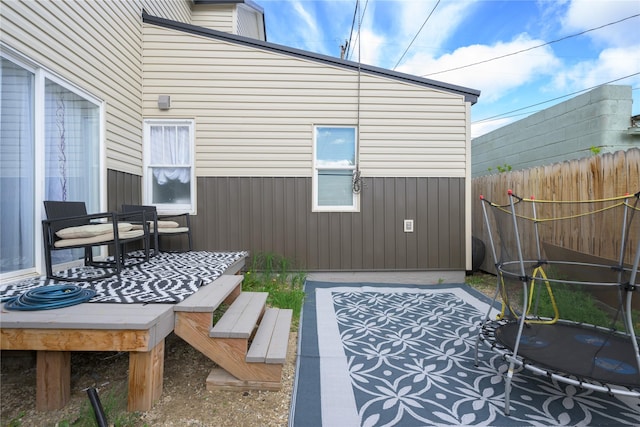 exterior space with a patio and a trampoline