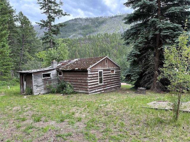 8 Cedar Gulch Ln, Thompson Falls, MT 59873 - view of yard with a view of trees and a mountain view