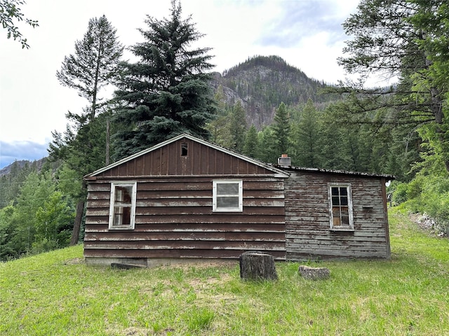 8 Cedar Gulch Ln, Thompson Falls, MT 59873 - view of side of home featuring a mountain view and a forest view