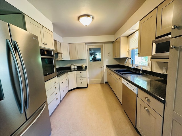 kitchen featuring appliances with stainless steel finishes and sink