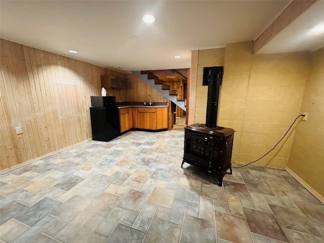 8 Cedar Gulch Ln, Thompson Falls, MT 59873 - bar area featuring wooden walls, stairs, light stone finish floors, and recessed lighting