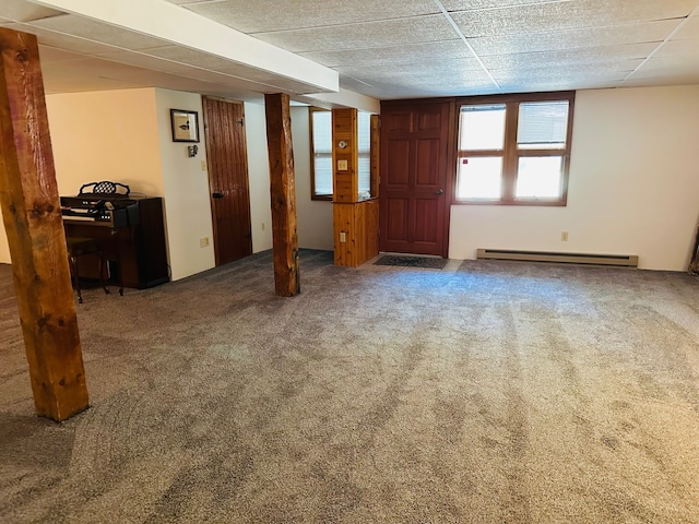 interior space with carpet flooring and a baseboard radiator