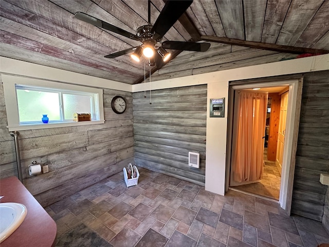 8 Cedar Gulch Ln, Thompson Falls, MT 59873 - interior space featuring stone finish flooring, a ceiling fan, wooden walls, and wooden ceiling