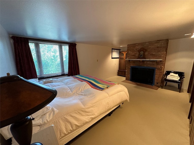 8 Cedar Gulch Ln, Thompson Falls, MT 59873 - bedroom with a brick fireplace and light carpet