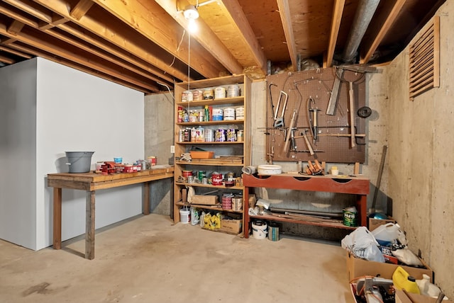 basement featuring a workshop area