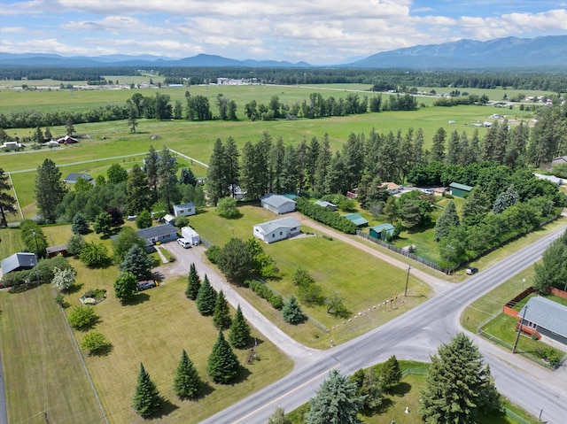 bird's eye view featuring a mountain view and a rural view