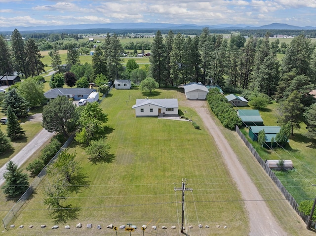 birds eye view of property featuring a mountain view