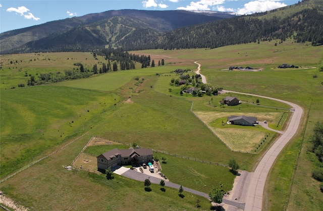 aerial view featuring a mountain view and a rural view