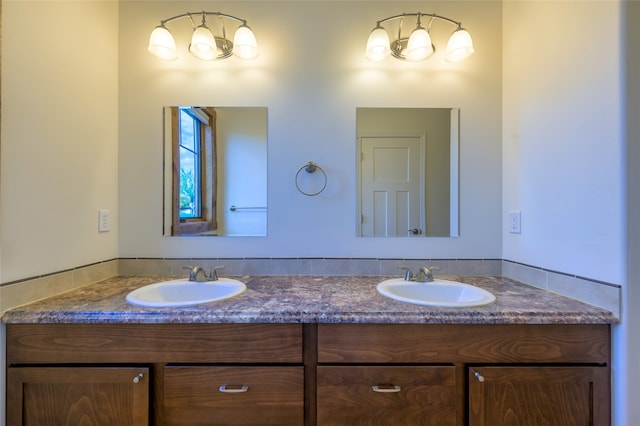 bathroom with double vanity