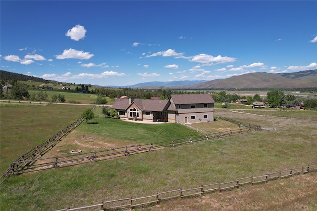 mountain view featuring a rural view