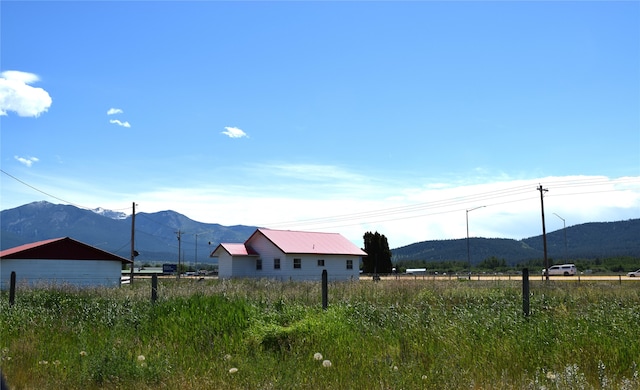 view of mountain feature featuring a rural view