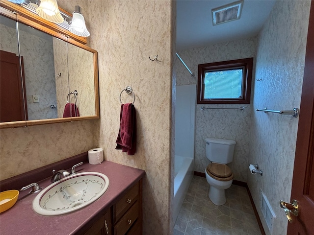 full bathroom with tile patterned floors, shower / bath combination, toilet, and vanity