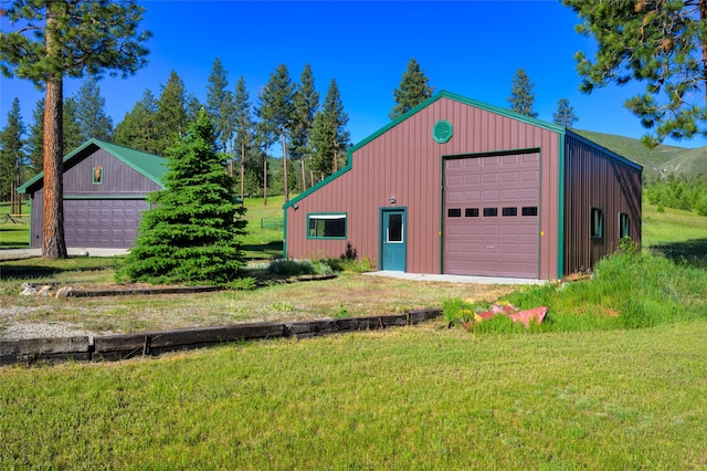 garage with a yard