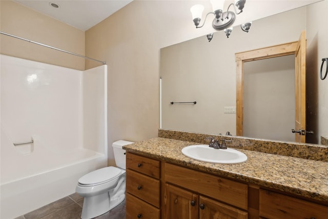 full bathroom featuring toilet, tile patterned floors, shower / washtub combination, and vanity