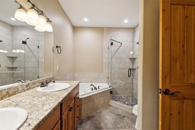 bathroom featuring double vanity, a stall shower, tile patterned floors, a garden tub, and a sink