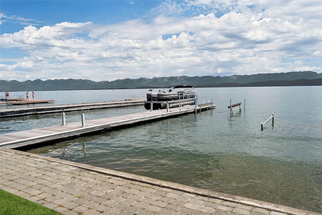 dock area with a water and mountain view