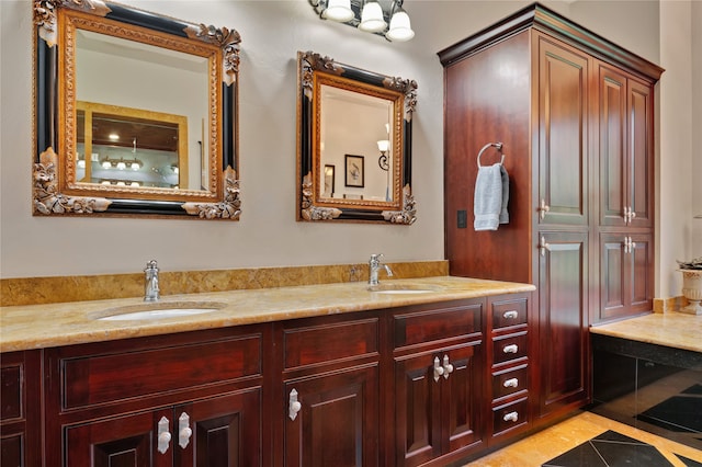 full bath featuring tile patterned flooring, a sink, and double vanity