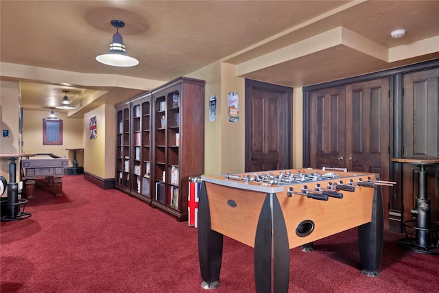 playroom featuring carpet and baseboards