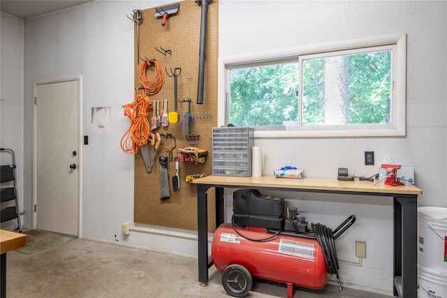 garage with a workshop area