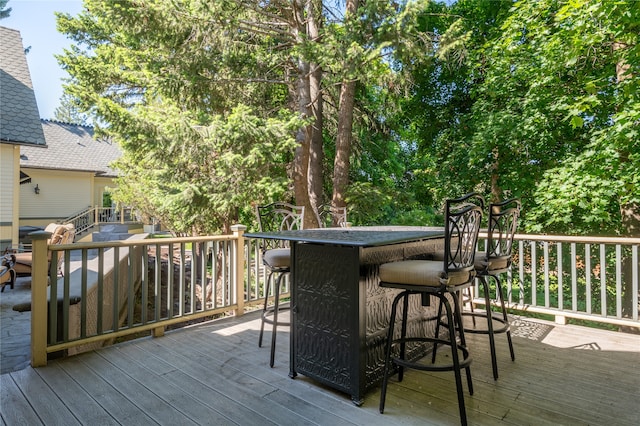 wooden deck with exterior bar