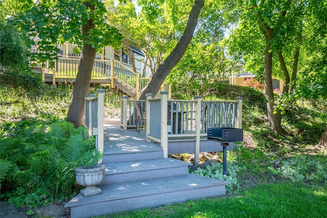 exterior space with stairway and a deck