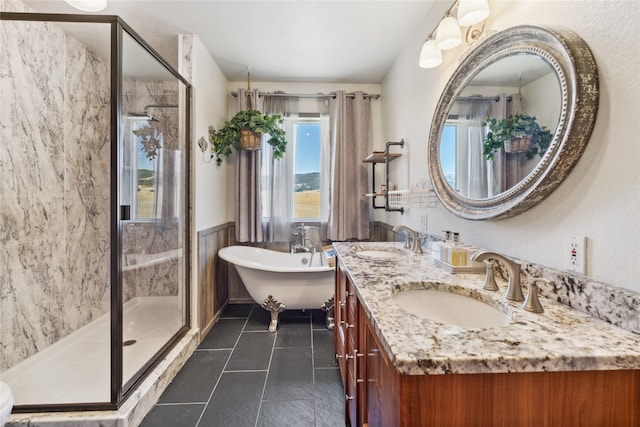 bathroom featuring tile patterned flooring, vanity, and plus walk in shower