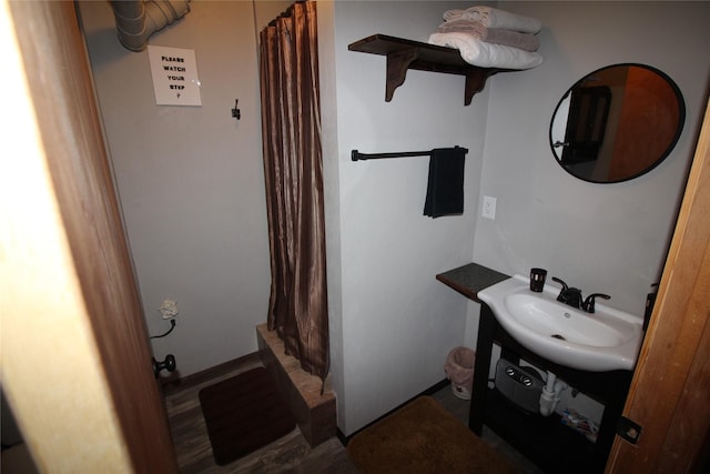 full bathroom with vanity and a shower with shower curtain