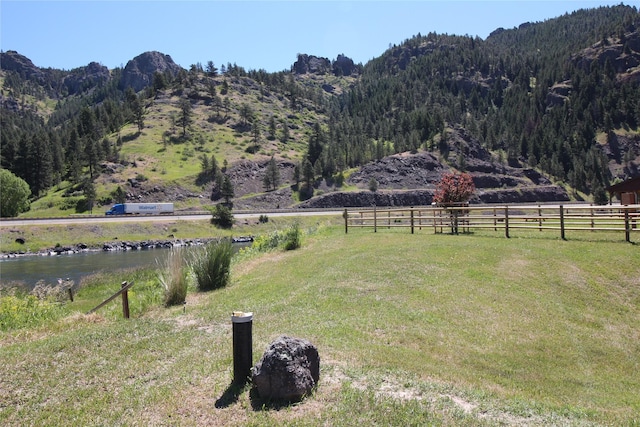 mountain view featuring a rural view