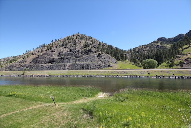 view of mountain feature with a water view