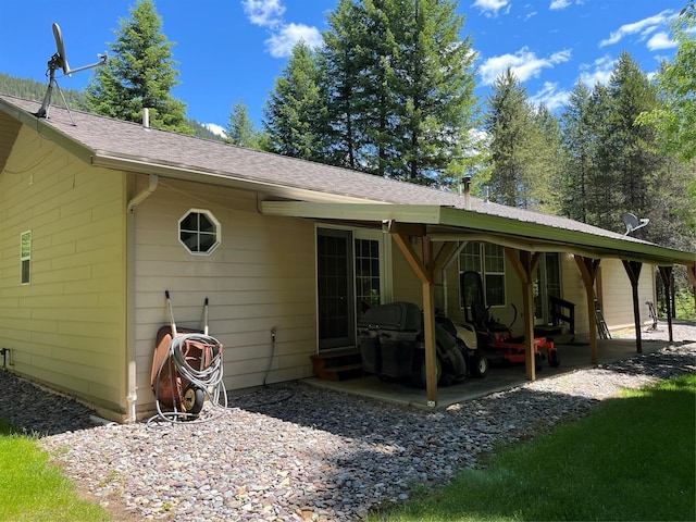 rear view of property with a patio area