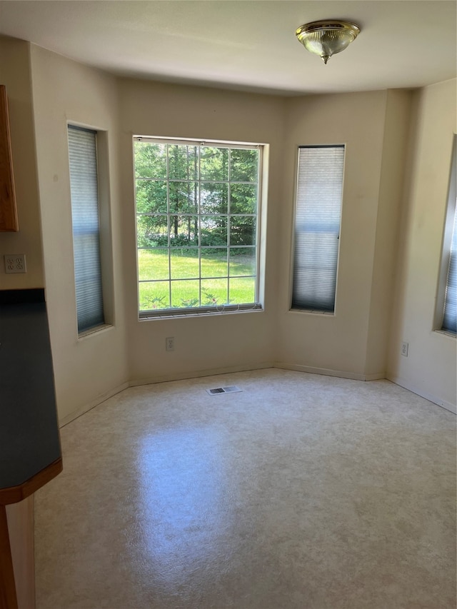 view of unfurnished dining area